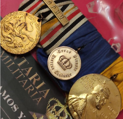 Decorative pin with 3 German imperial decorations