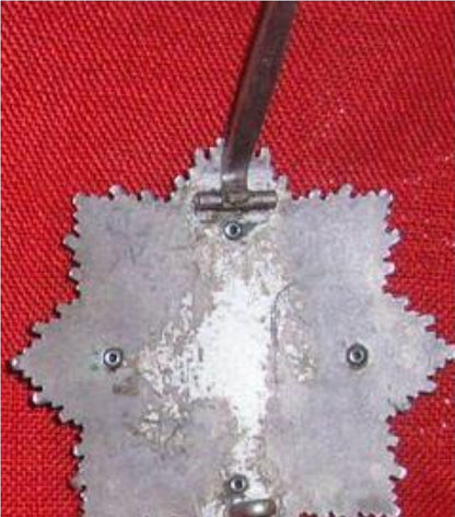 German Cross, or fried egg in Silver category.