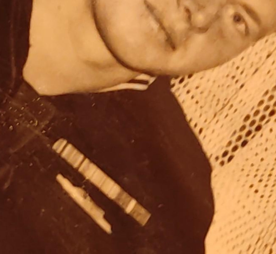 Set of insignia etc. and photos of a North American submarine from the Second World War