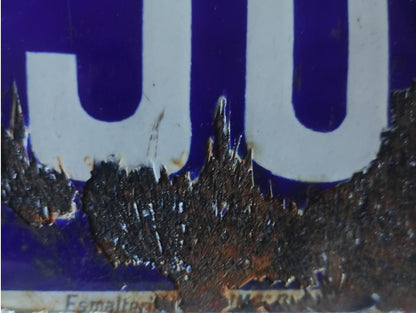 Enameled plaque on General Sanjurjo street